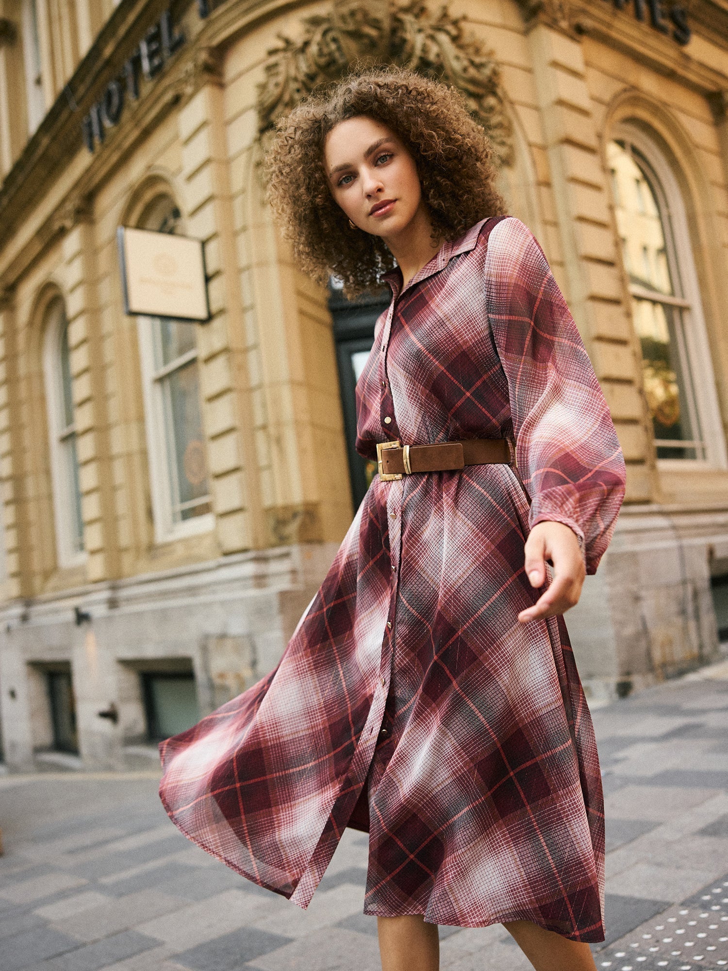 Young Women wearing a Suzy Shier Plaid Midi Shirt Dress 