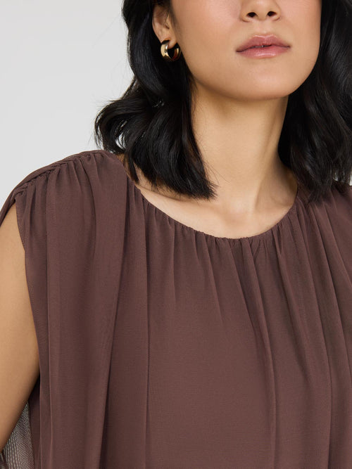 Sleeveless Bubble Hem Top