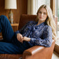 Oceana Printed Pussy Bow Blouse - Woman Wearing V-Neck Long Sleeve Top - Suzy Shier