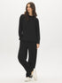 Black Cloud Fleece Tunic with Raglan Sleeves - Woman Wearing Long Sleeve Crew Neck Top - Suzy Shier