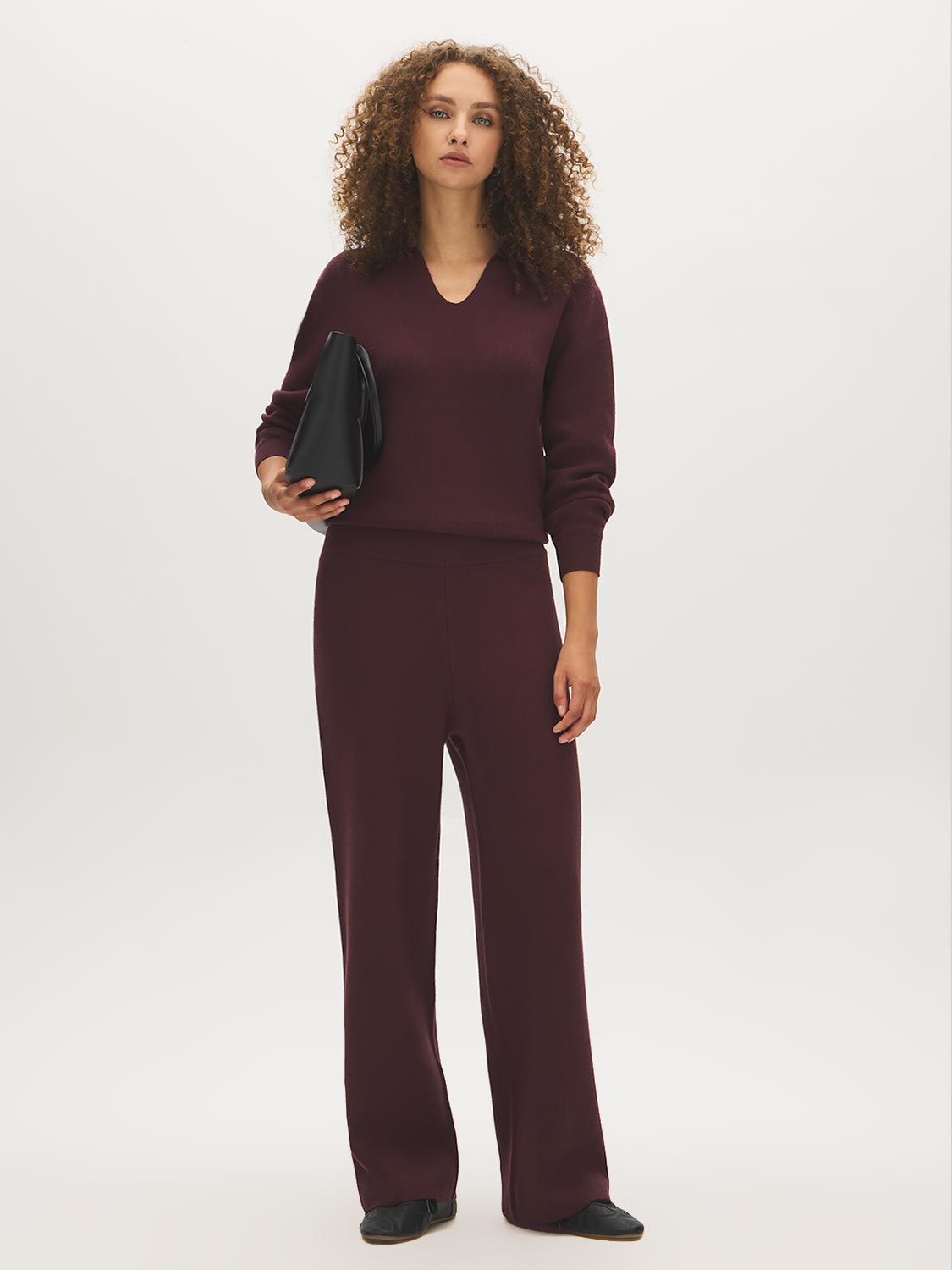 Merlot Sweater Knit Straight Leg Pant - Woman Wearing Pull-On Knit Trousers - Suzy Shier