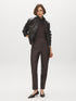 Coffee Bean Faux Leather Slim Leg Pull-On Pant - Woman Wearing Sleek Faux Leather Trousers - Suzy Shier