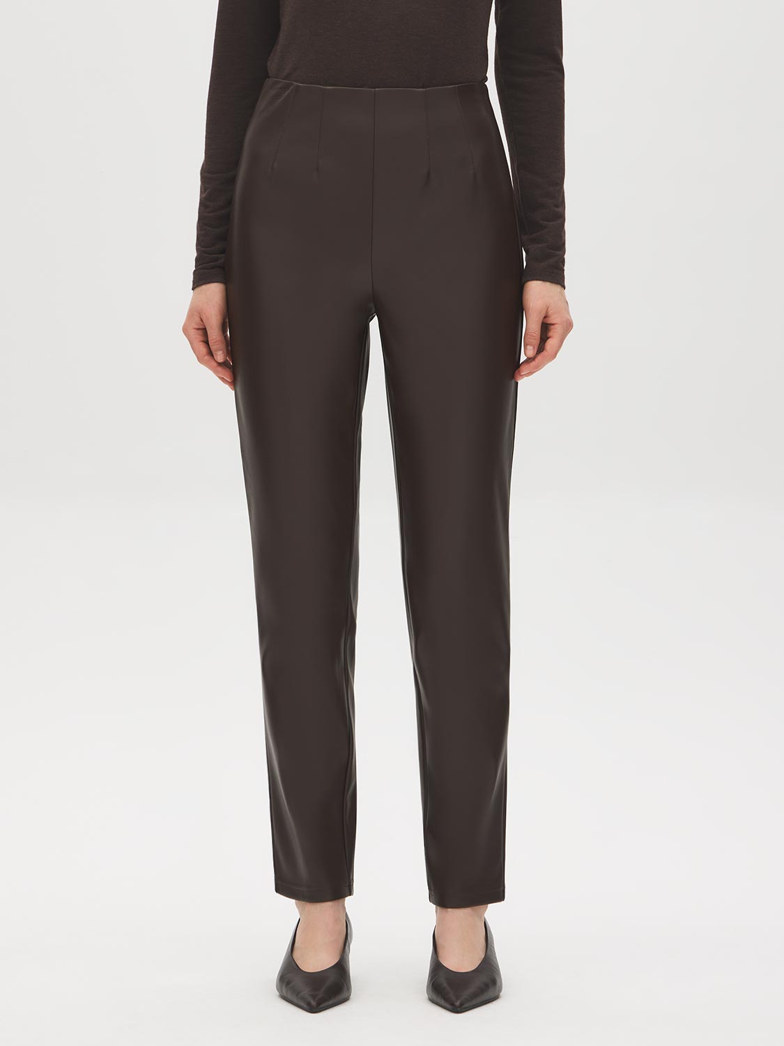 Coffee Bean Faux Leather Slim Leg Pull-On Pant - Woman Wearing Sleek Faux Leather Trousers - Suzy Shier