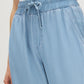 Light Wash Elastic Waist Wide-Leg Denim Pant - Woman Wearing Casual Wide-Leg Pants - Suzy Shier