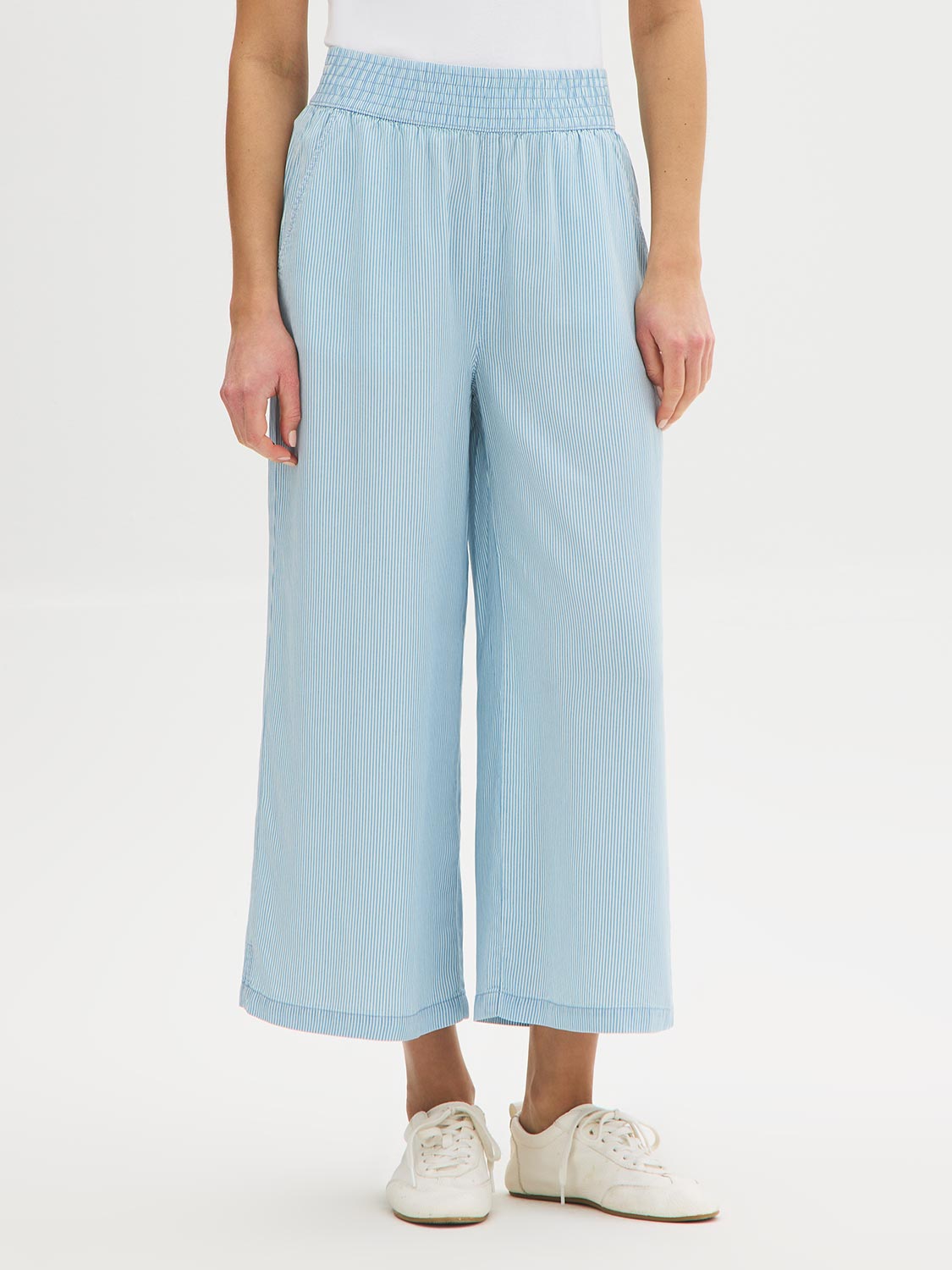 Light Wash Stripe Denim Tencel Gaucho Pant - Woman Wearing Wide-Leg Pants with Smocked Waistband - Suzy Shier