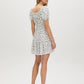 Snow White Ditsy Print Mini Dress - Woman Wearing Off-the-Shoulder Tiered Dress - Suzy Shier