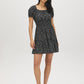Jet Black Ditsy Print Square Neck Mini Dress - Woman Wearing Playful Tiered Dress - Suzy Shier