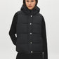 Black Quilted Puffer Vest with Hood - Woman Wearing Water-Resistant Vest - Suzy Shier