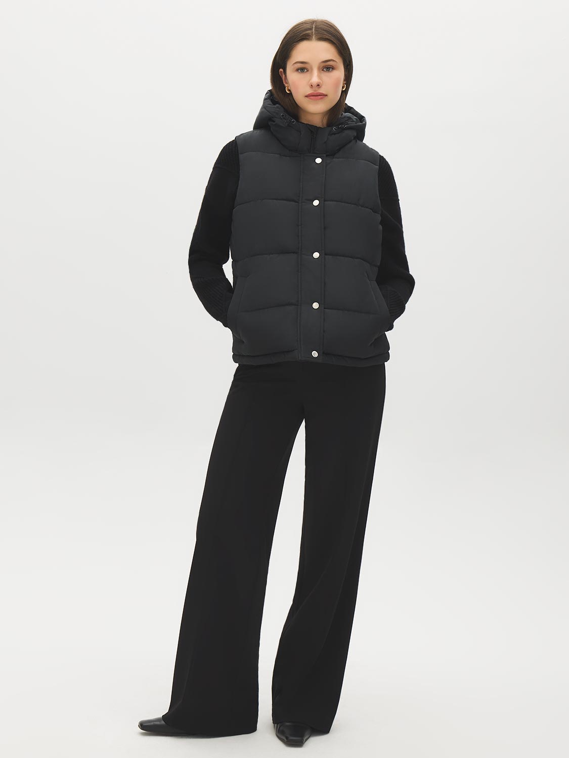 Black Quilted Puffer Vest with Hood - Woman Wearing Water-Resistant Vest - Suzy Shier