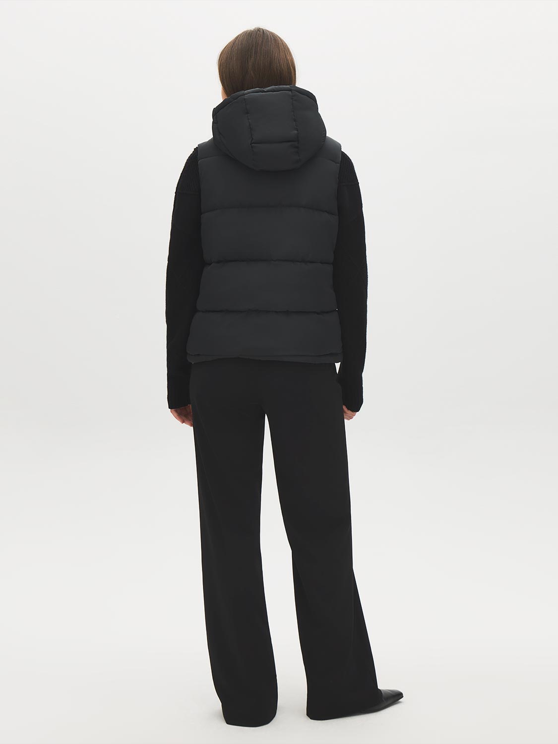 Black Quilted Puffer Vest with Hood - Woman Wearing Water-Resistant Vest - Suzy Shier