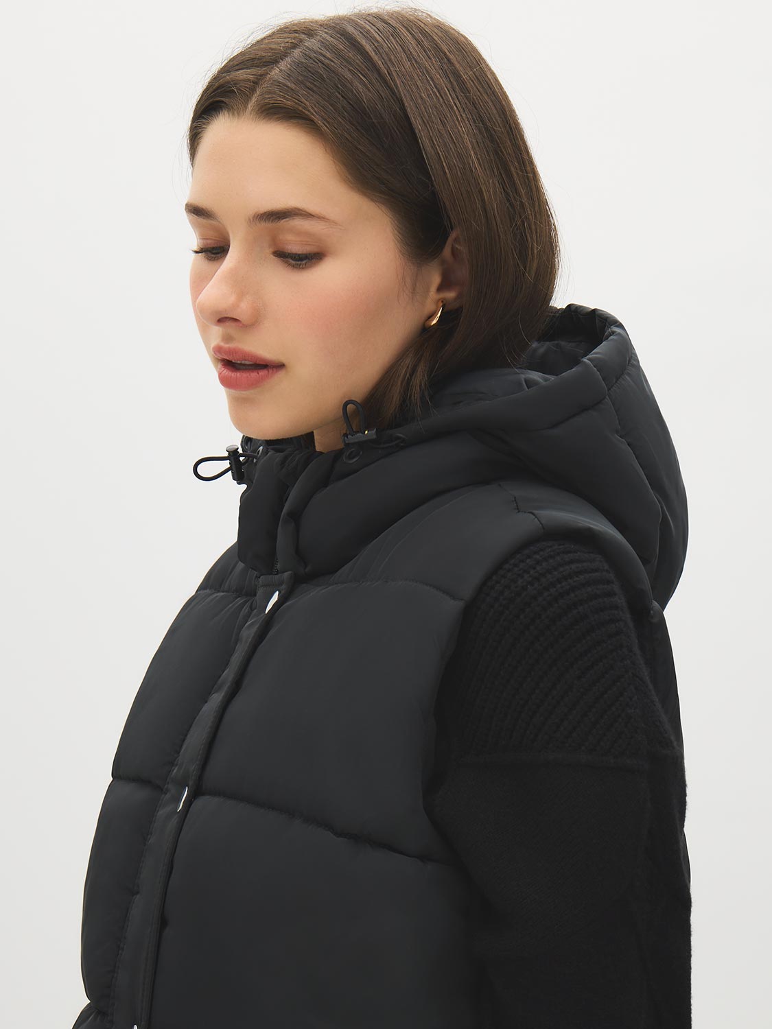 Black Quilted Puffer Vest with Hood - Woman Wearing Water-Resistant Vest - Suzy Shier