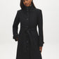 Black Faux Wool Funnel Neck Coat with Wrap Belt - Woman Wearing Mid-Length Winter Coat - Suzy Shier