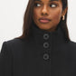 Black Faux Wool Funnel Neck Coat with Wrap Belt - Woman Wearing Mid-Length Winter Coat - Suzy Shier