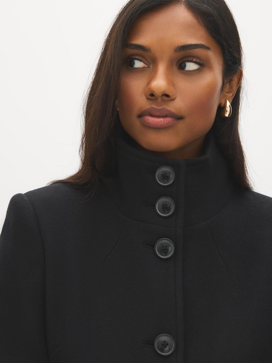 Black Faux Wool Funnel Neck Coat with Wrap Belt - Woman Wearing Mid-Length Winter Coat - Suzy Shier