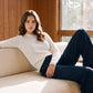 Snow White Cable Knit Crew Neck Sweater - Woman Wearing Classic Cable Knit Pullover - Suzy Shier