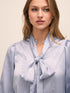 Steel Blue Floral Damask Tie Neck Bow Blouse - Woman Wearing Elegant Woven Top - Le Chateau