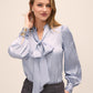 Steel Blue Floral Damask Tie Neck Bow Blouse - Woman Wearing Elegant Woven Top - Le Chateau