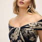 Dark Sapphire/Gold Off-Shoulder Metallic Crinkle Gown - Woman Wearing Evening Dress with Twist Front Detail - Le Chateau