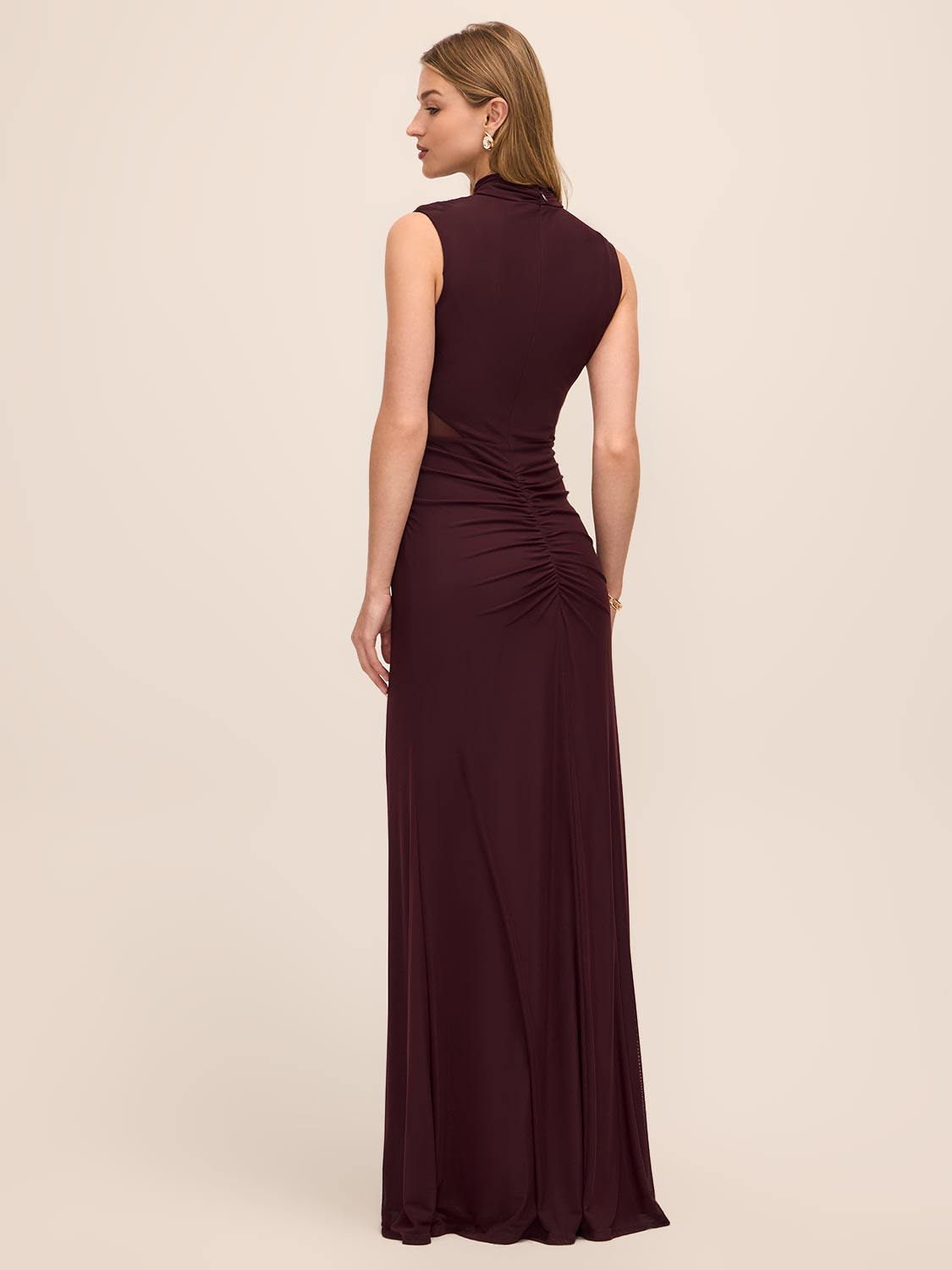 Black Cherry Sleeveless Mesh Gown with Mock Neck - Woman Wearing Elegant Floor-Length Dress - Le Chateau