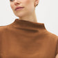 Bison Sleeveless Mock Neck Sweater Top - Close-up Fabric Detail - Suzy Shier
