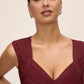 Burgundy V-Neck Bandage Sheath Dress - Close-up Neckline Detail - Le Chateau