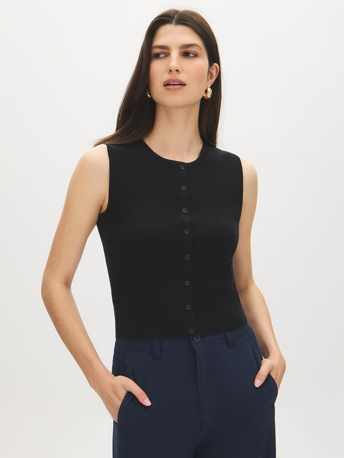 Black Sleeveless Ribbed Knit Sweater with Faux Button Placket - Woman Wearing Simple Knit Top - Suzy Shier