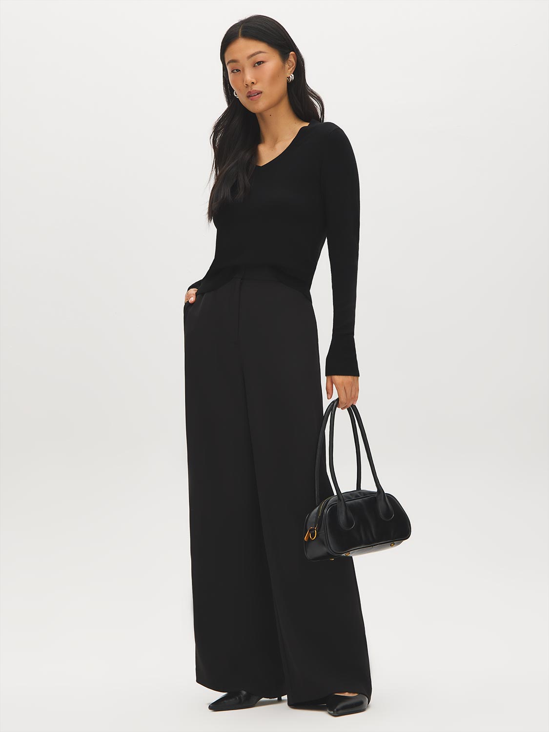 Black V-Neck Knit Sweater with Ribbed Cuffs - Front View - Suzy Shier