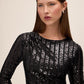 Black Sequin Stripe Scoop Neck Dress - Close-up Fabric Detail - Le Chateau