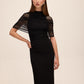 Black Knit Crepe Sheath Dress with Mesh Cape Overlay - Side Profile View - Le Chateau