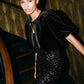 Black Velour Bolero with Satin Bow Ties - Woman Wearing Evening Cover-Up with Puff Sleeves - Le Chateau