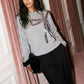 Grey Melange Crew Neck Hacci Top with Sequin Bow - Close-up Bow Detail - Suzy Shier