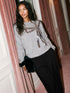 Grey Melange Crew Neck Hacci Top with Sequin Bow - Close-up Bow Detail - Suzy Shier