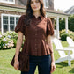 Milk Chocolate Textured Peplum Blouse with Puff Sleeves - Front View - Suzy Shier