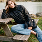 Black Vegan Leather Bomber Jacket with Funnel Neck - Woman Wearing Stylish Outerwear - Suzy Shier