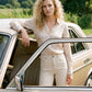 Oat Milk Printed Satin Blouse with V-Neck - Woman Wearing Button-Up Long Sleeve Top - Suzy Shier