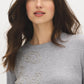 Light Grey Bead Embellished Knit Sweater - Close-up Embellishment Detail - Suzy Shier