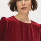 Lipstick Velvet Cropped Top with Balloon Sleeves - Close-up Fabric Detail - Suzy Shier
