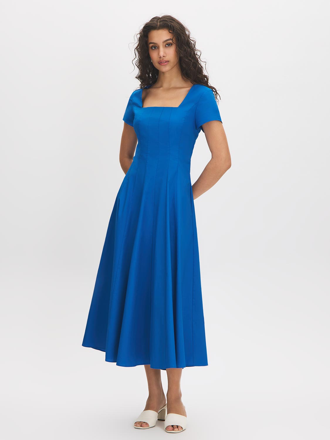 Classic Blue Square Neck Poplin Dress - Woman Wearing Cap Sleeve Dress with Paneled Detail - Suzy Shier