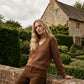 Bison V-Neck Sweater with Lace Trim - Woman Wearing Knit Sweater with Lace Detail - Suzy Shier