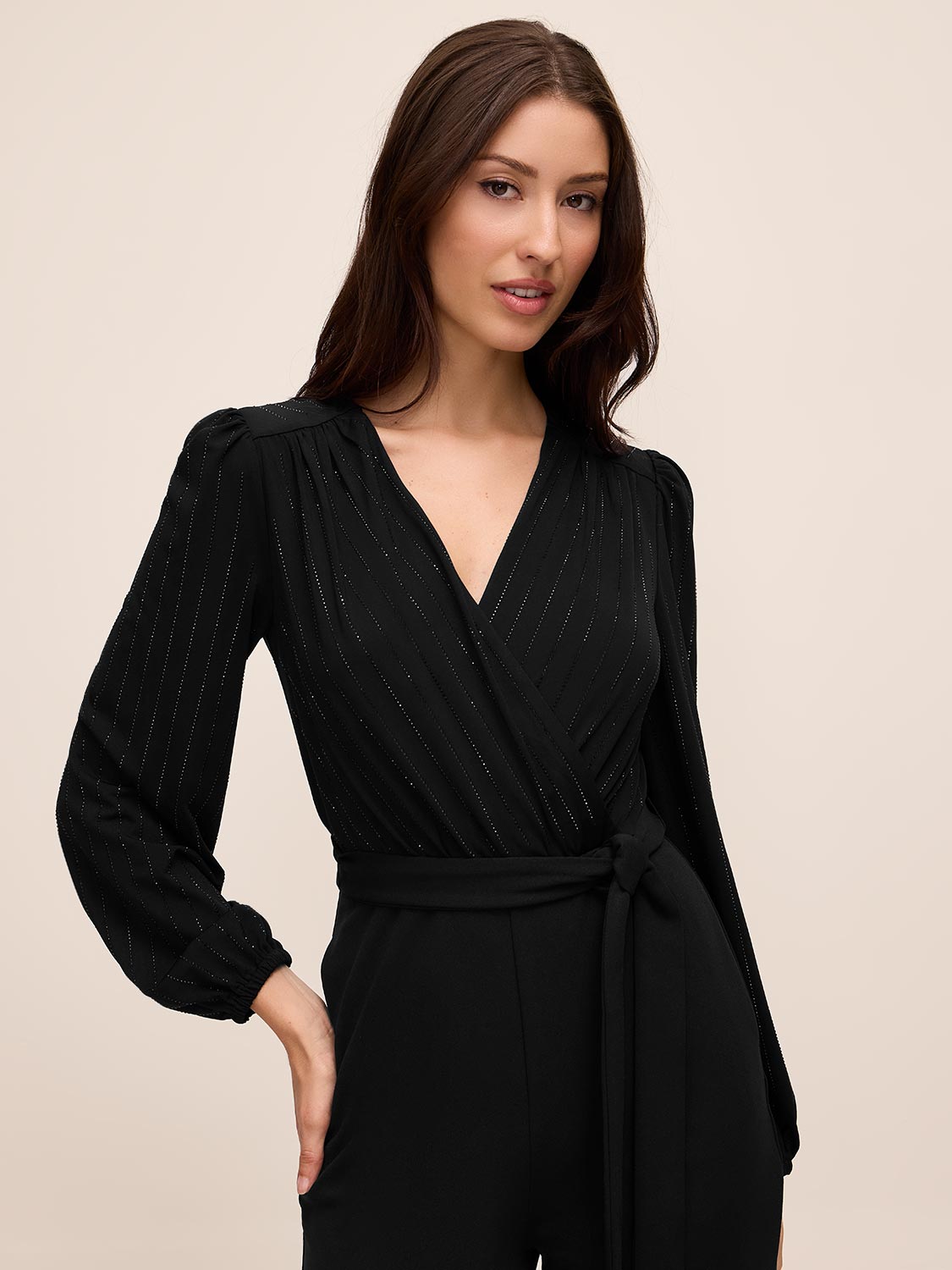Black Crossover Neck Knit Jumpsuit - Close-up Front View - Le Chateau