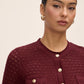 Bordeaux Pointelle Gold Button Cardigan - Close-up Fabric Detail - Le Chateau