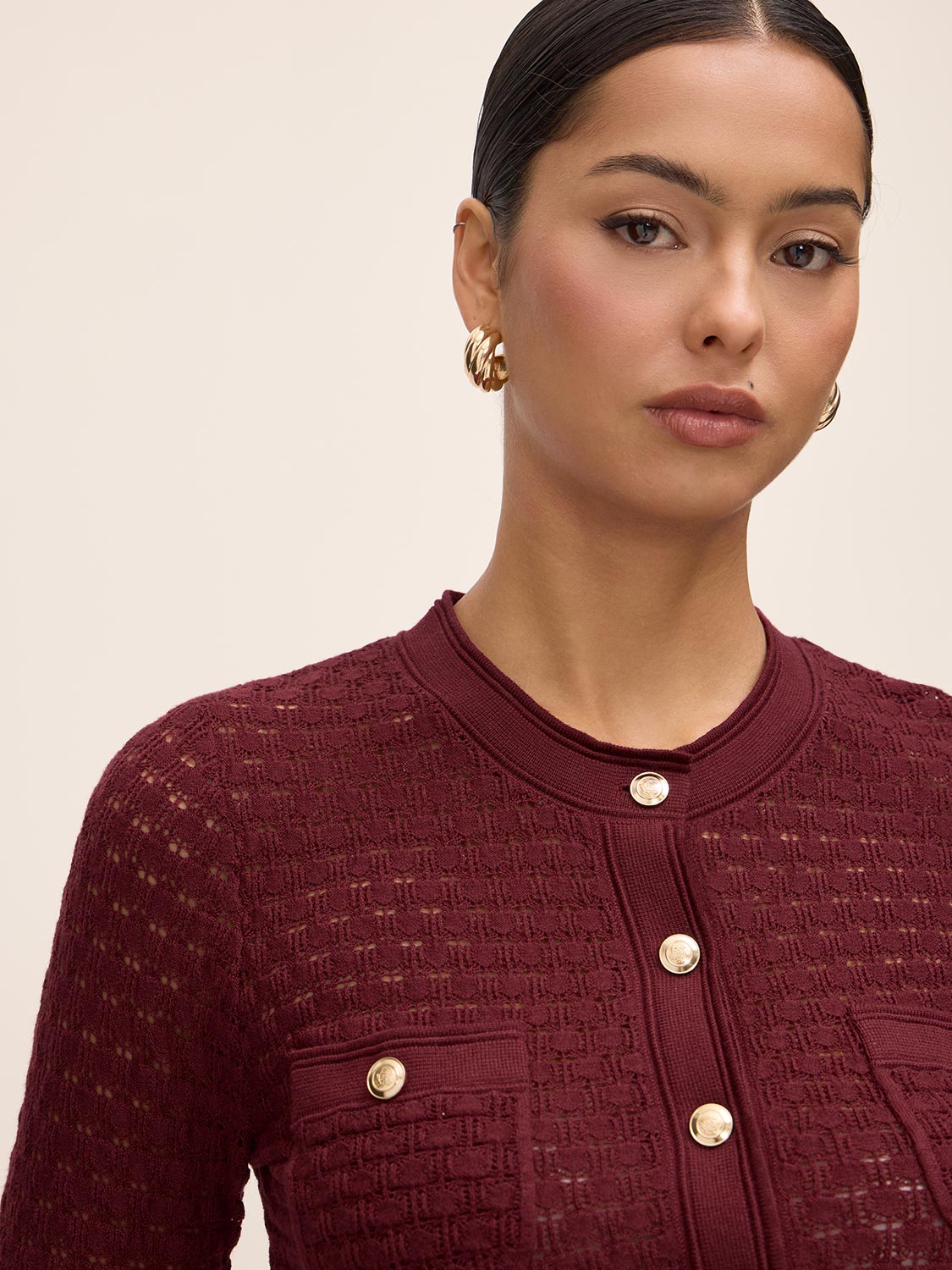 Bordeaux Pointelle Gold Button Cardigan - Close-up Fabric Detail - Le Chateau