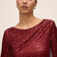 Burgundy Sequin Mesh Gown with Cape - Close-up Fabric Detail - Le Chateau