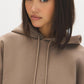 Wood Hooded Faux Suede Sweatshirt with Front Pocket - Close-up Fabric Detail - Suzy Shier