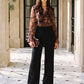 Black Wide Leg Woven Pants with Side Button Detail - Woman Wearing Tailored Trousers - Le Chateau