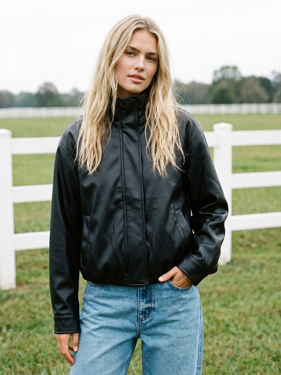 Black Vegan Leather Bomber Jacket with Funnel Neck - Woman Wearing Stylish Outerwear - Suzy Shier