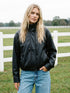 Black Vegan Leather Bomber Jacket with Funnel Neck - Woman Wearing Stylish Outerwear - Suzy Shier