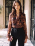 Black/Toffee Paisley Ruffle Blouse - Woman Wearing Flowing Patterned Top - Le Chateau