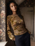 Floral Flocked Mesh Top with Balloon Sleeves - Woman Wearing Textured Print Blouse - Suzy Shier