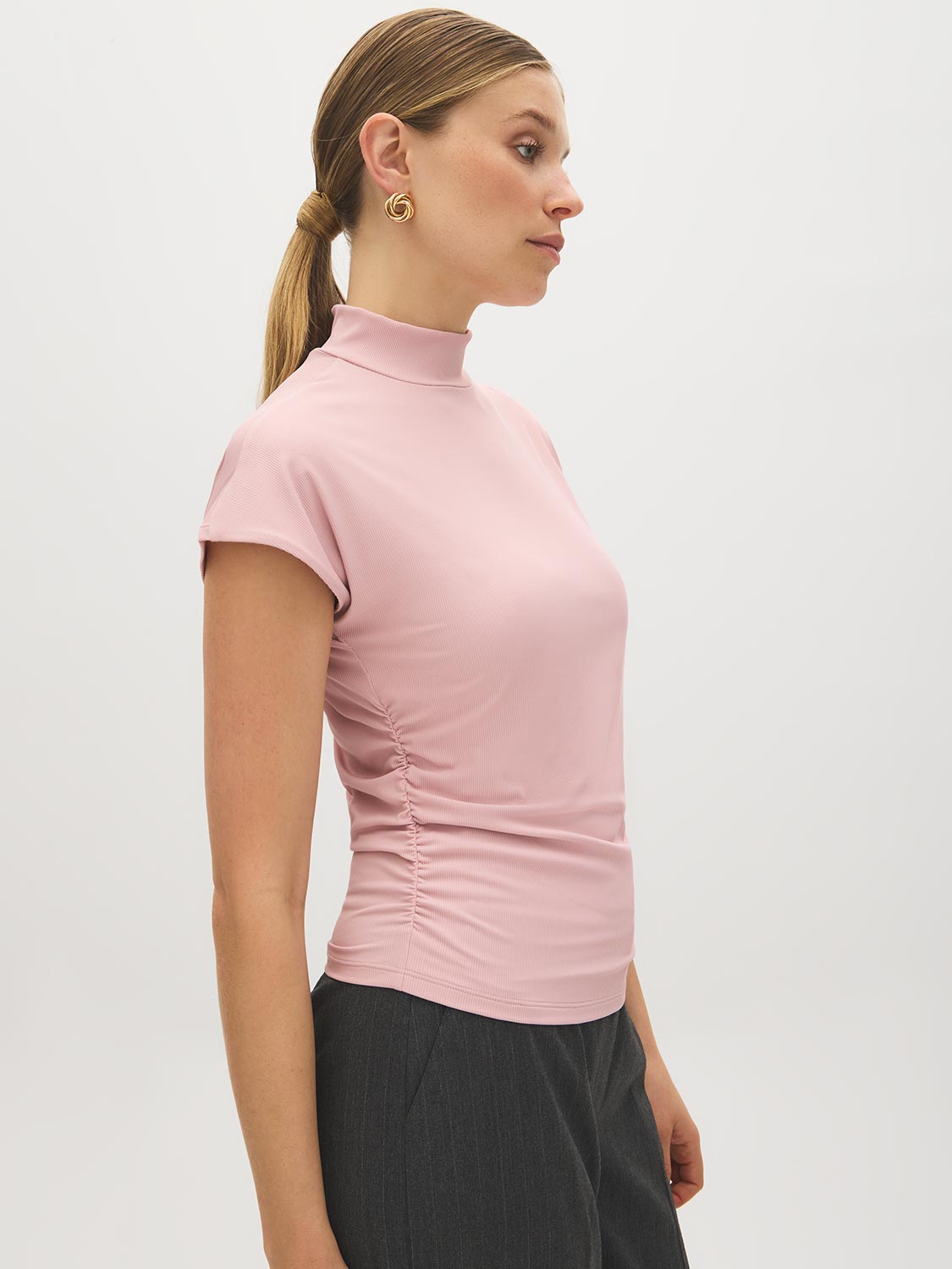Zephyr Mock Neck Ribbed Top with Side Ruching - Woman Wearing Fitted Knit Top - Suzy Shier